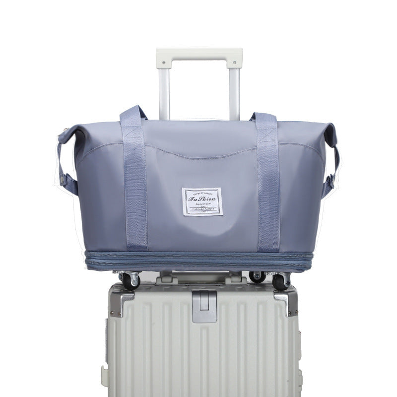 Large Capacity Travel Bag Folding Dry Wet Separation Luggage Bag With Wheels