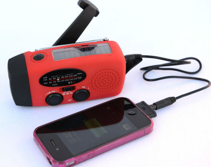 Solar hand crank USB charging radio flashlight